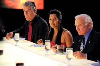Anthony Bourdain, Padma Lakshmi, and Buzz Aldrin dining during the "Space Food" episode of Top Chef