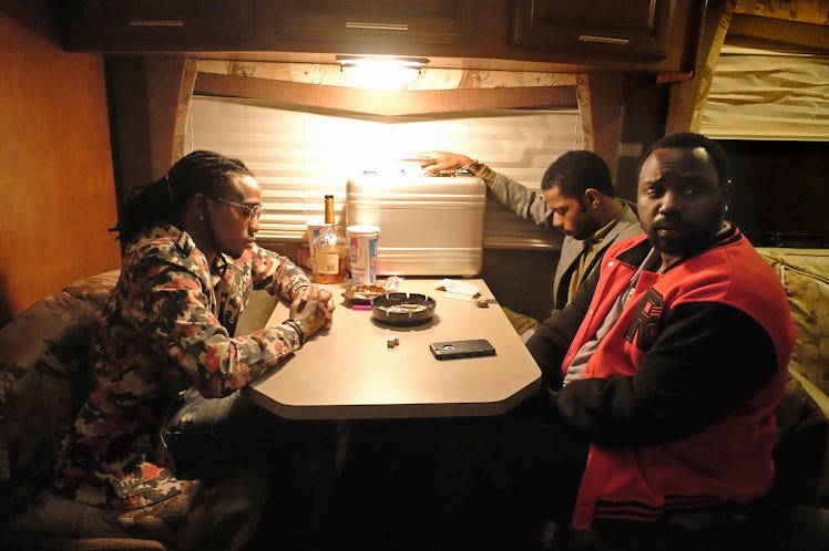 Offset, Brian Tyree Henry and LaKeith Stanfield sitting at the table.