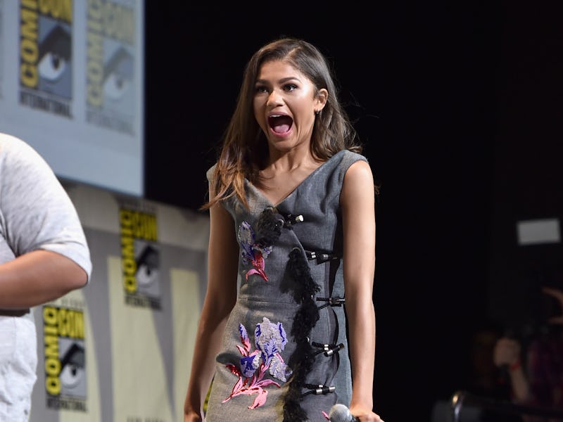 Zendaya Coleman in a grey floral dress with an excited facial expression at Comic Con
