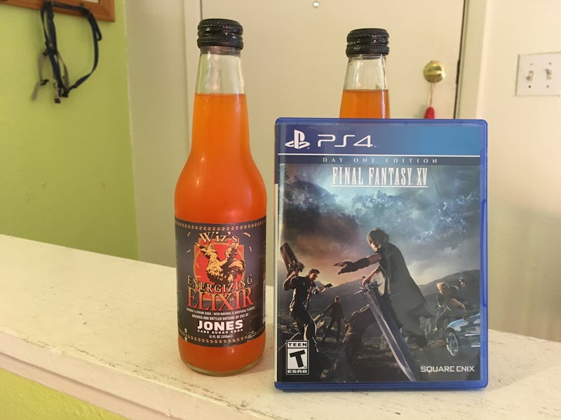 Two bottles of orange Wiz soda and the video game Final Fantasy XV