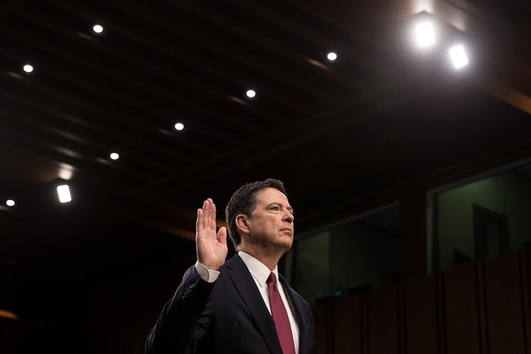 WASHINGTON, DC - JUNE 08: Former FBI Director James Comey is sworn in before the Senate Intelligence...