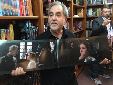 Rancho Obi-Wan founder Steve Sansweet holding an illustration book