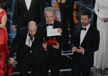 Jordan Horowitz, Warren Beatty, and host Jimmy Kimmel onstage during the Academy Awards in 2017
