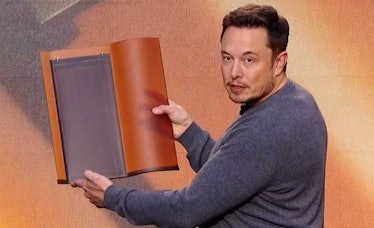 Elon Musk demonstrating the Tesla solar roof in October.