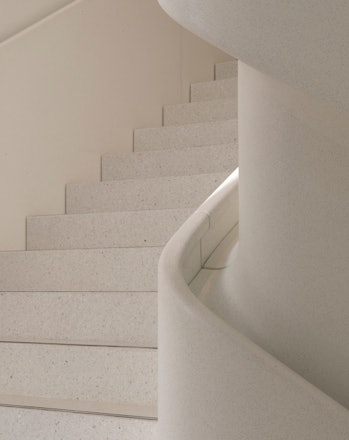 Even the staircases feature a gorgeous marble hue.