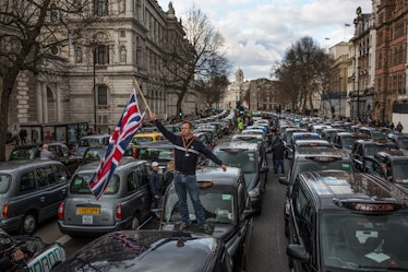 London Taxi drivers stage a protest on Whitehall on February 10, 2016 in London, England. Drivers ar...