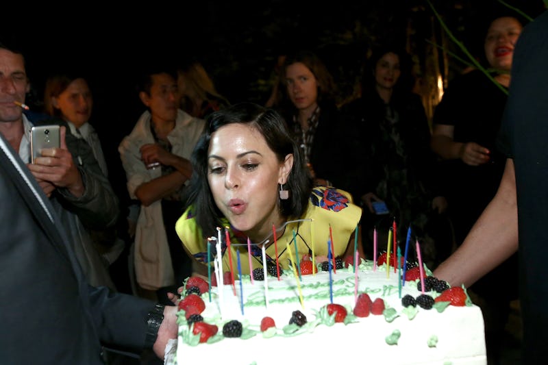 #girlboss Sophia Amoruso blowing candles on a birthday cake