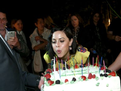 #girlboss Sophia Amoruso blowing candles on a birthday cake