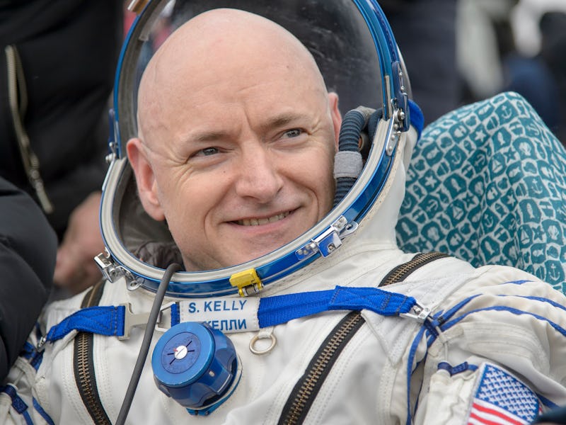 A closeup of astronaut Scott Kelly in his uniform