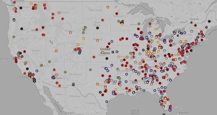 The U.S. Hate Map in black and white with colorful dots all over it 