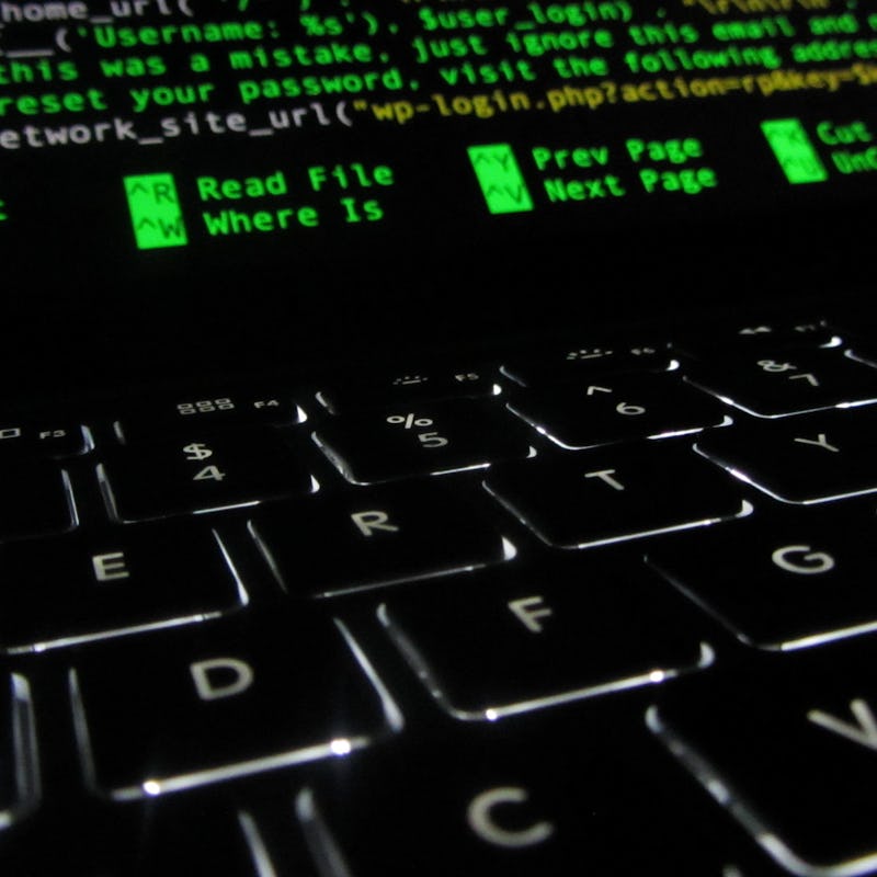 A close-up of a black keyboard of a laptop