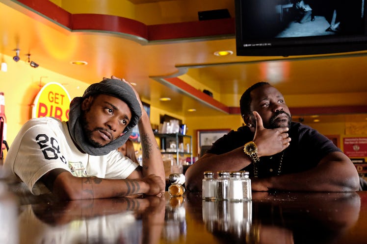LaKeith Stanfield and Brian Tyree Henry sitting in a bar in "Atlanta"