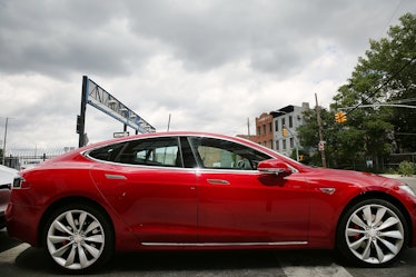 A parked red Tesla model S