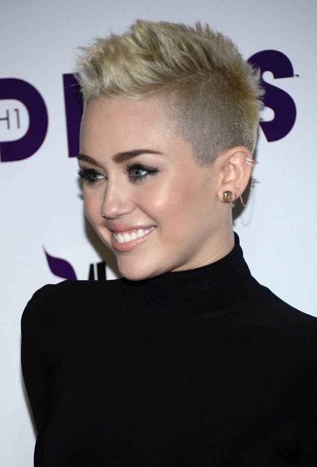 Miley Cyrus Debuts Brown Hair But We Fear It May Be A Wig — PHOTO