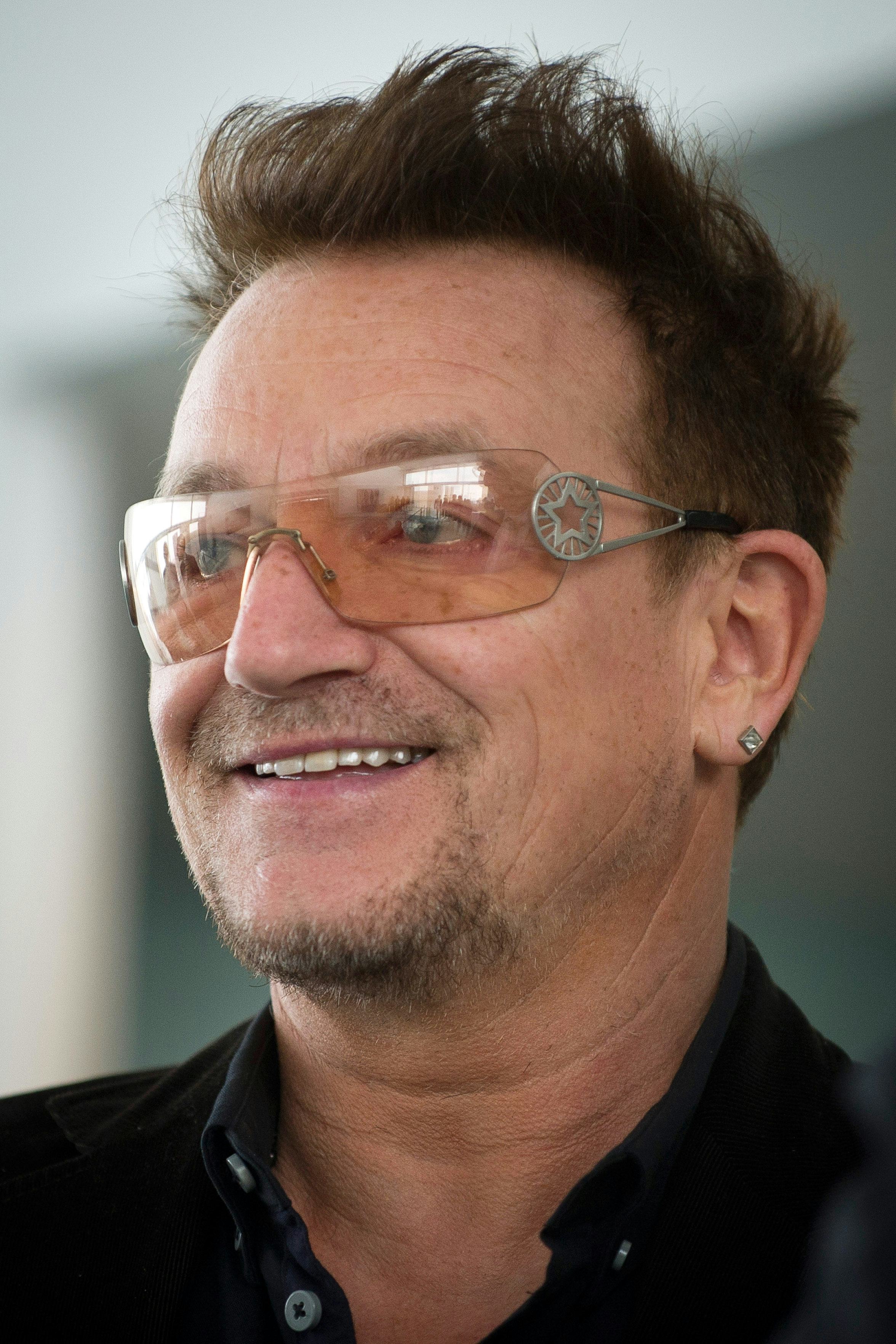 bono yellow sunglasses