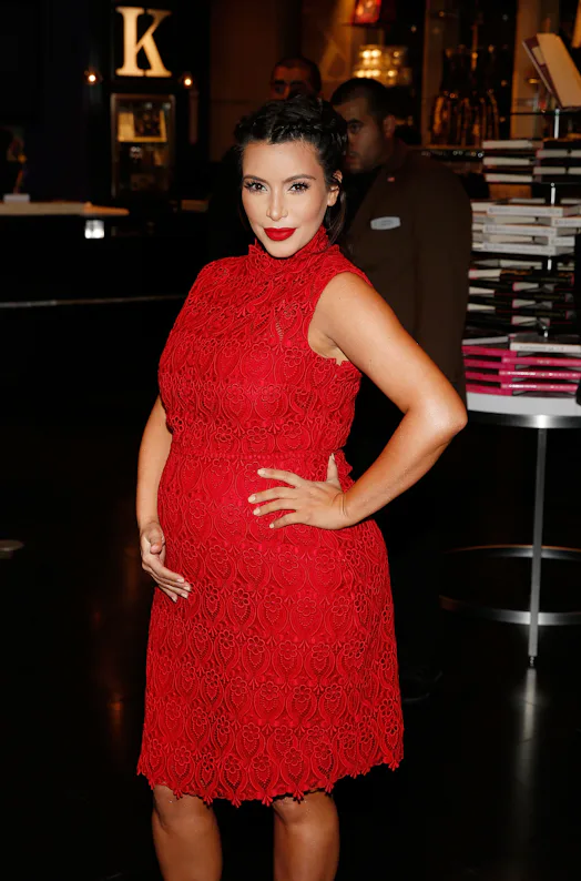 kim kardashian pregnant pink dress Kim Kardashian is reportedly pregnant, and the news has taken everyone by surprise. With her well-documented family dynamics, Kardashian's pregnancy announcement has sparked a media frenzy, leaving fans curious about how this