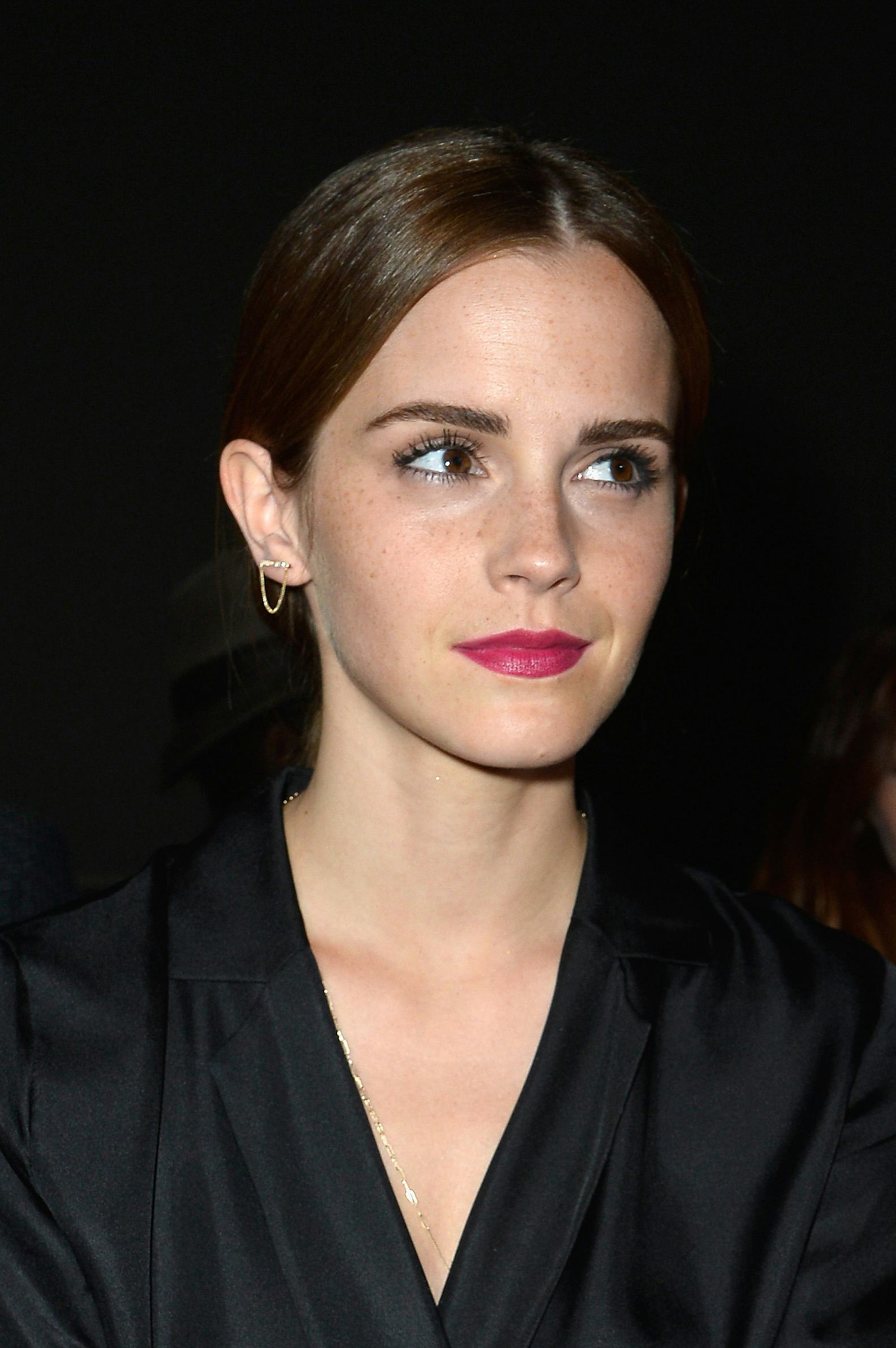 Emma Watson's Bangs Are Putting A New Spin On The Top Knot — PHOTOS