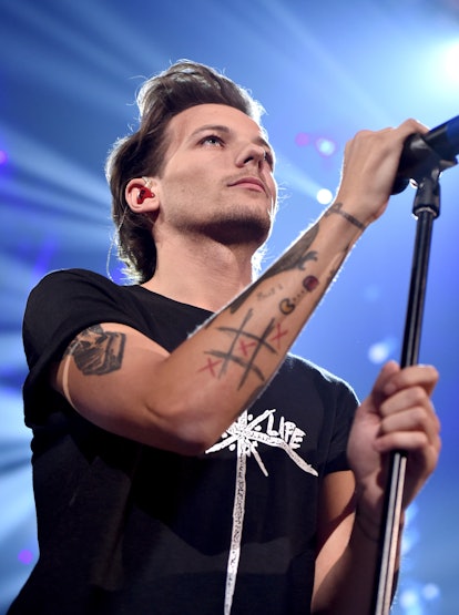 How Many Tattoos Does Louis Tomlinson Have? A Whole Lot, So Let's Break  Down 6 of the Biggies