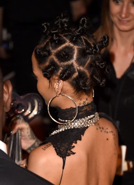 Are space buns, '90s hair wraps, and nose cuffs cultural appropriation? Read on to learn.
