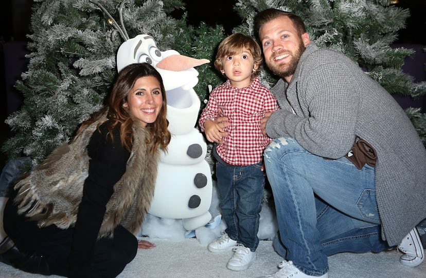 Jamie-Lynn Sigler with her husband and son posing next to a cardboard Olaf from 'Frozen.'