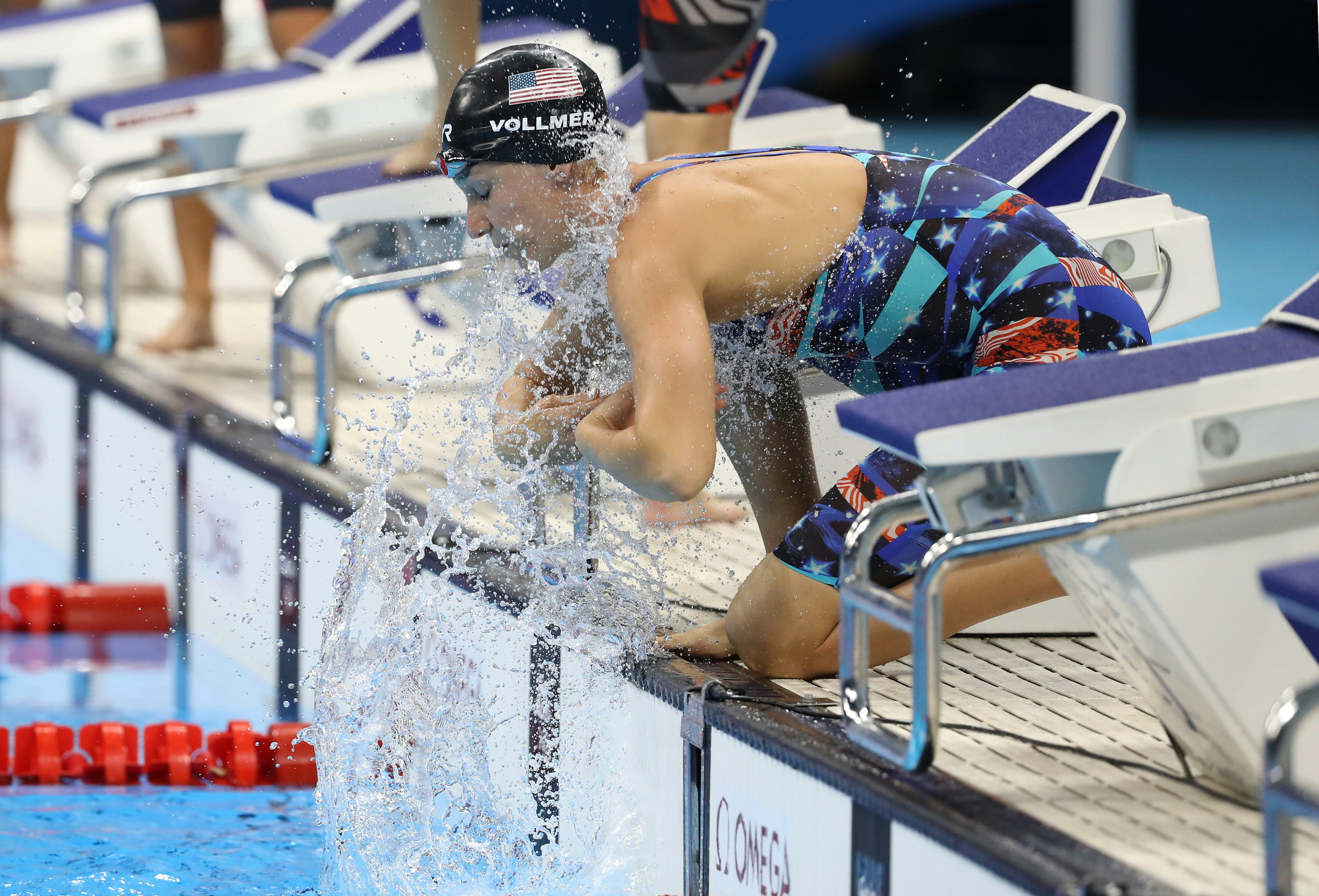 Why Do Olympic Swimmers Wear Long Swimsuits? The FullBody Uniform
