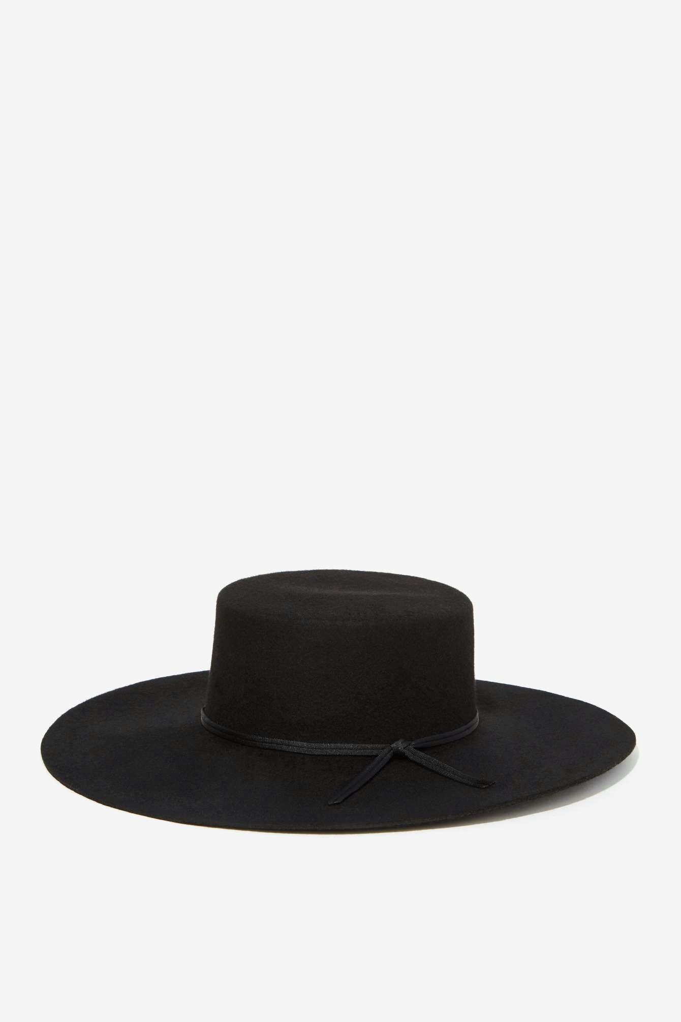 7 Winter Hats For Big Heads Because You Shouldn't Have To Squeeze Into