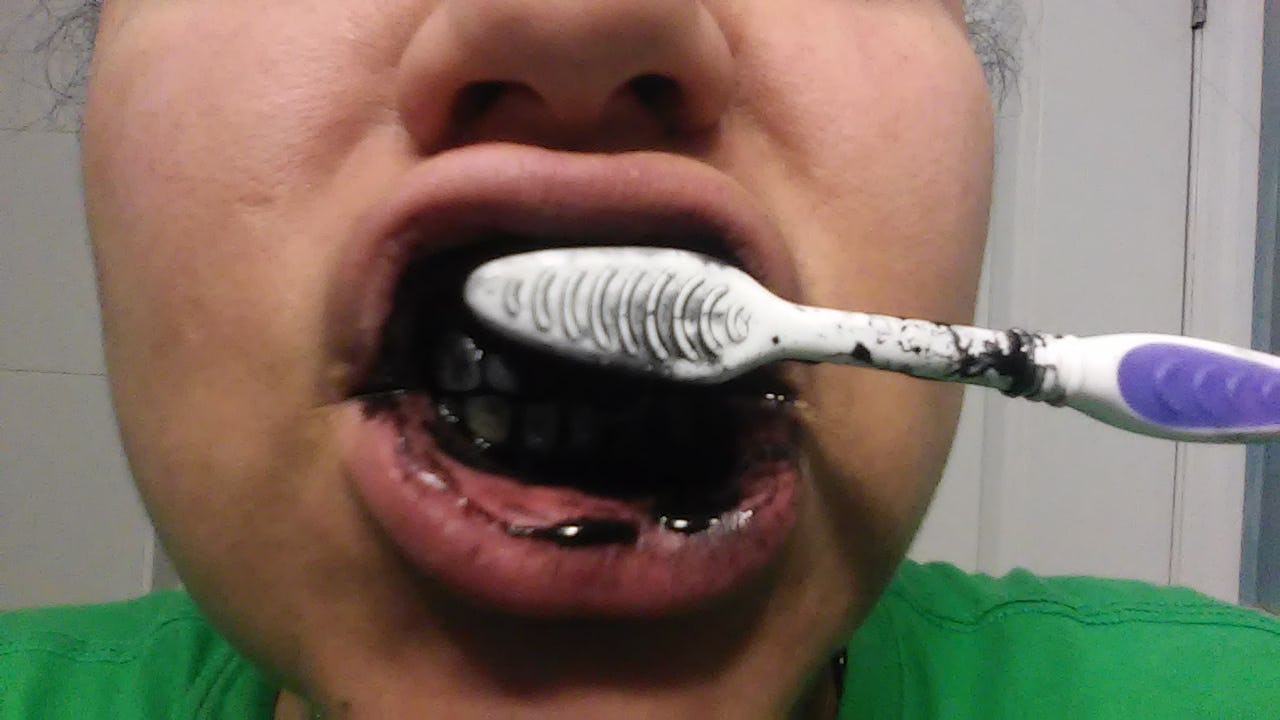 Does Activated Charcoal Whiten Teeth? I Brushed With It For A Week & Here's What Happened