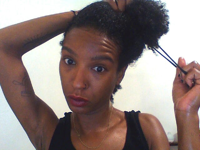 How To Get A Knot Out Of Kinky Hair Without Damaging Your Strands