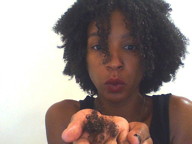 How To Get A Knot Out Of Kinky Hair Without Damaging Your Strands