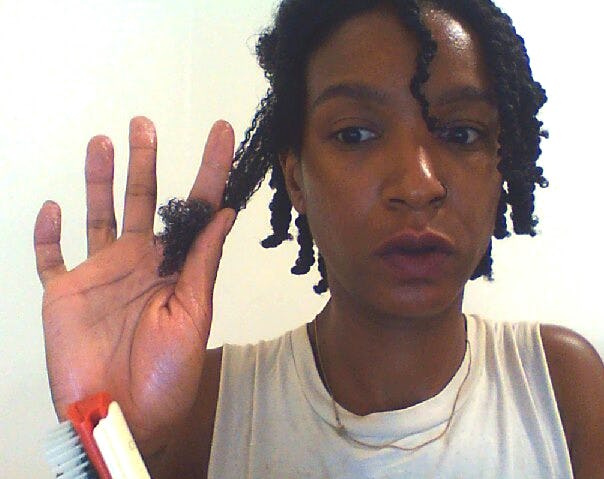 How To Get A Knot Out Of Kinky Hair Without Damaging Your Strands