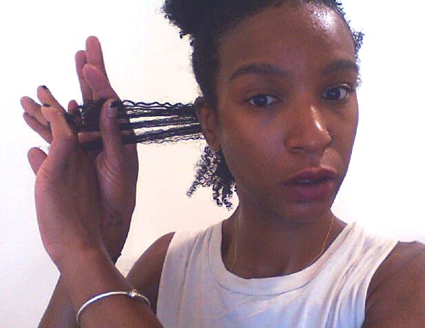 How To Get A Knot Out Of Kinky Hair Without Damaging Your Strands