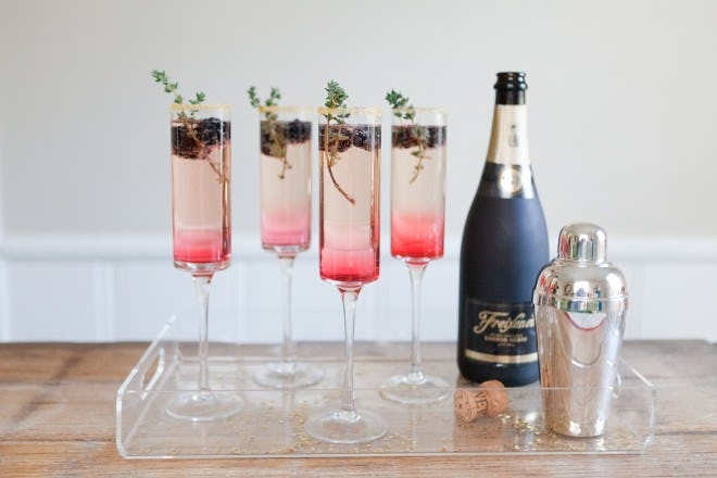 9 Ways to Make Cheap Champagne Feel Expensive, Because That's Something We Can All Toast To
