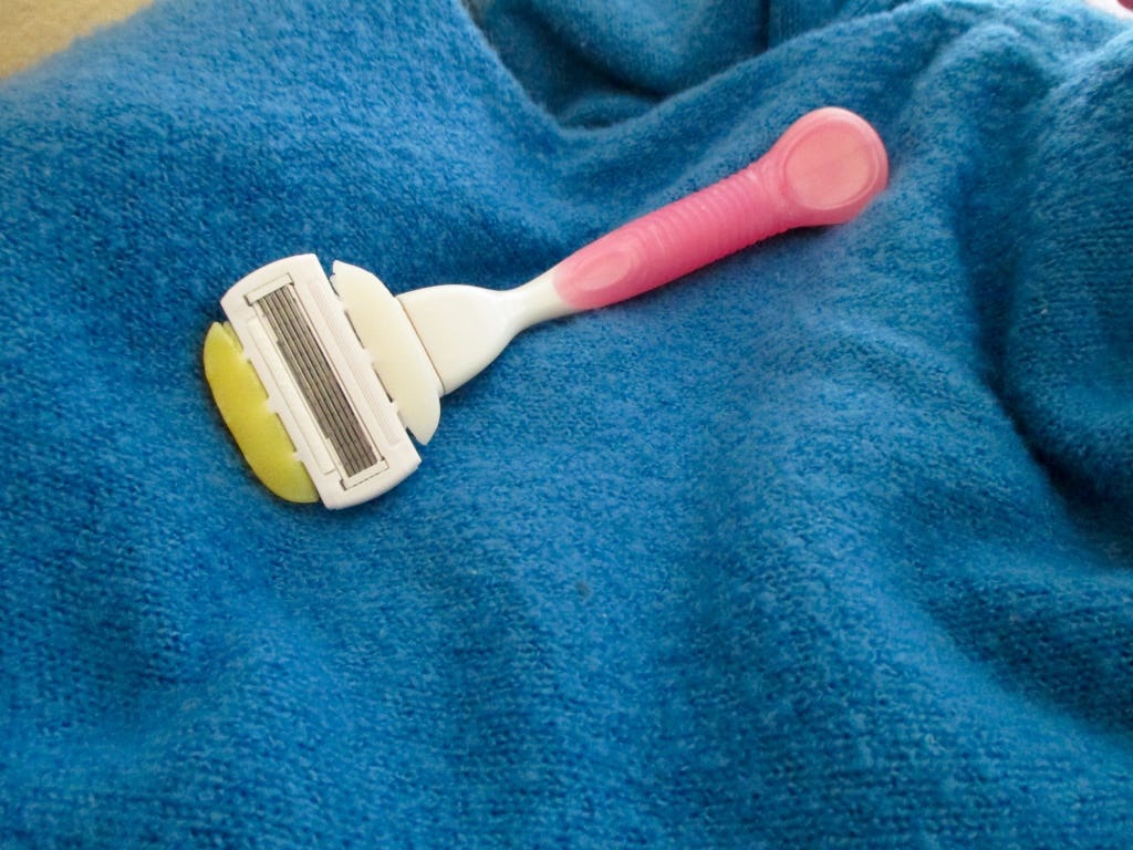 6 Sweater Hacks That Will Save Your Knits From Shrinkage, Stains, & Pills