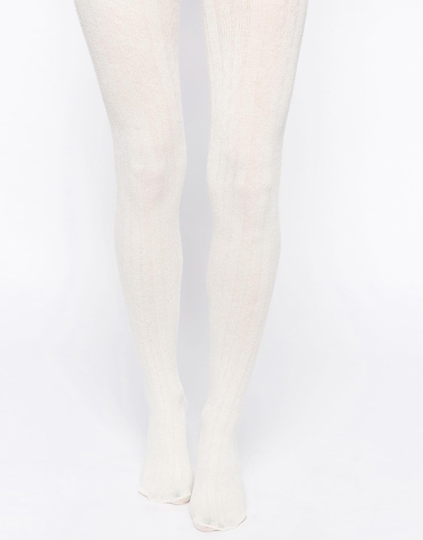 The Warmest Tights To Wear Underneath Jeans So You Don't Have To Give