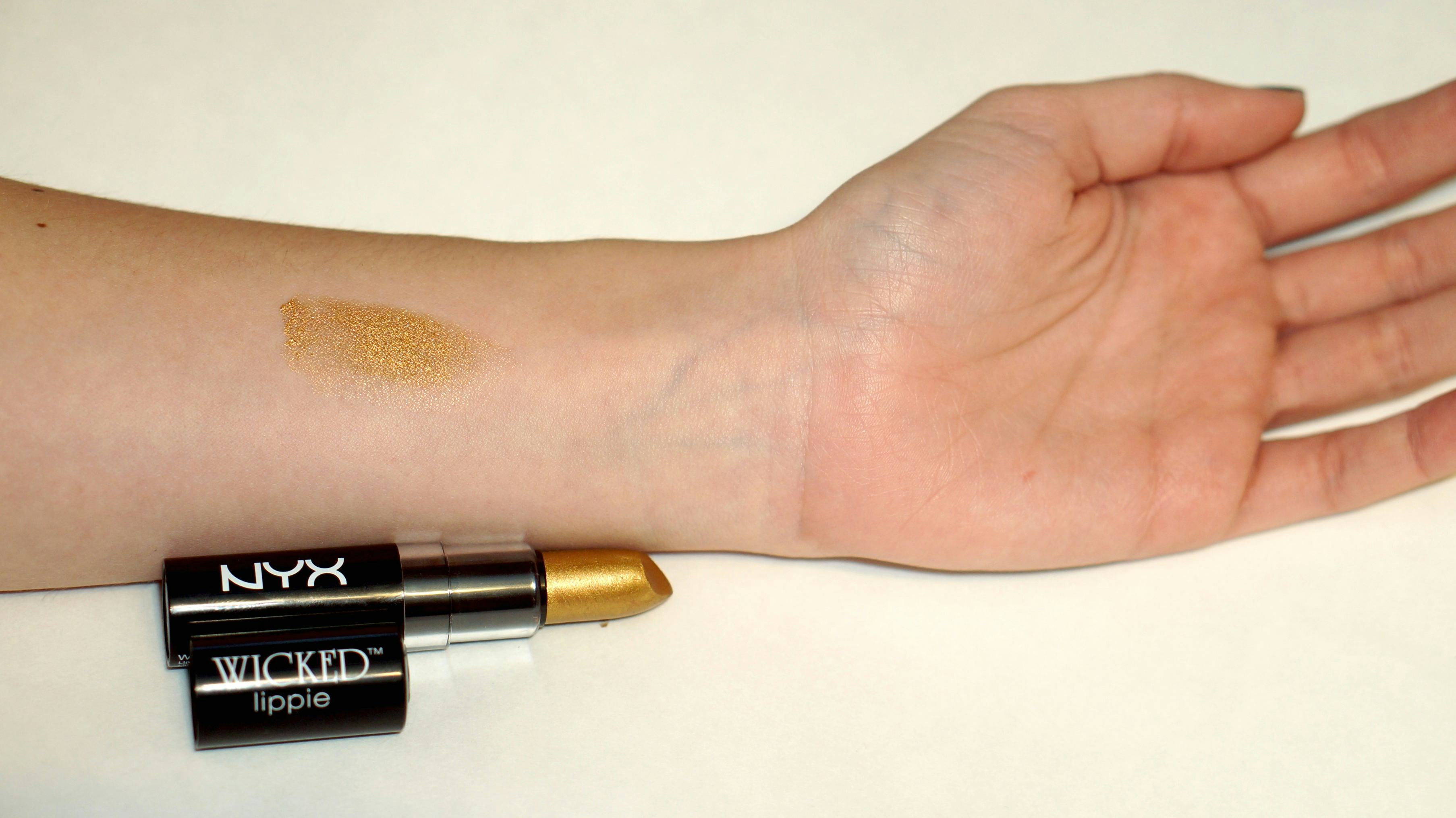 Try Gold Lipstick For The Holidays With These 4 Ways To Wear It