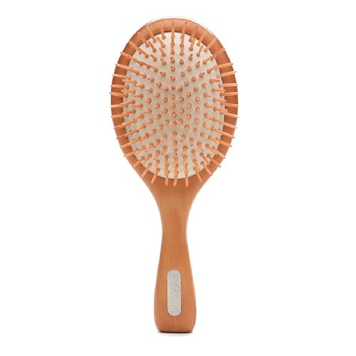 How To Stop Your Hair From Falling Out When Brushing, Because It's No