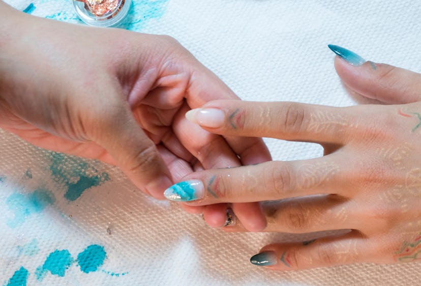 Geode nails are a top manicure trend on Pinterest.