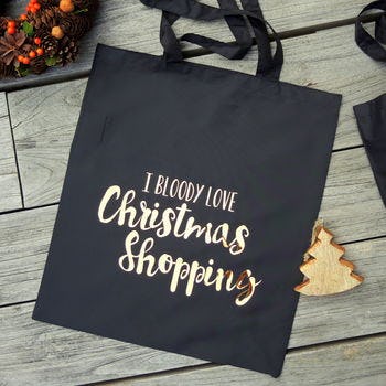 13 Holiday Themed Handbags To See You Through The Festive Season