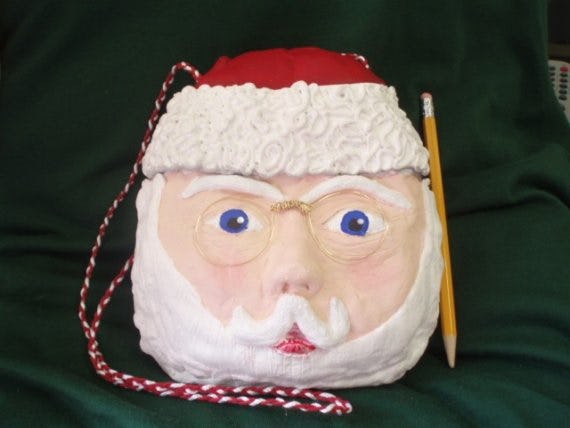 13 Holiday Themed Handbags To See You Through The Festive Season