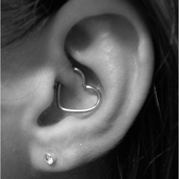 15 Pretty Ear Piercings That'll Inspire You To Add More Studs, Stat