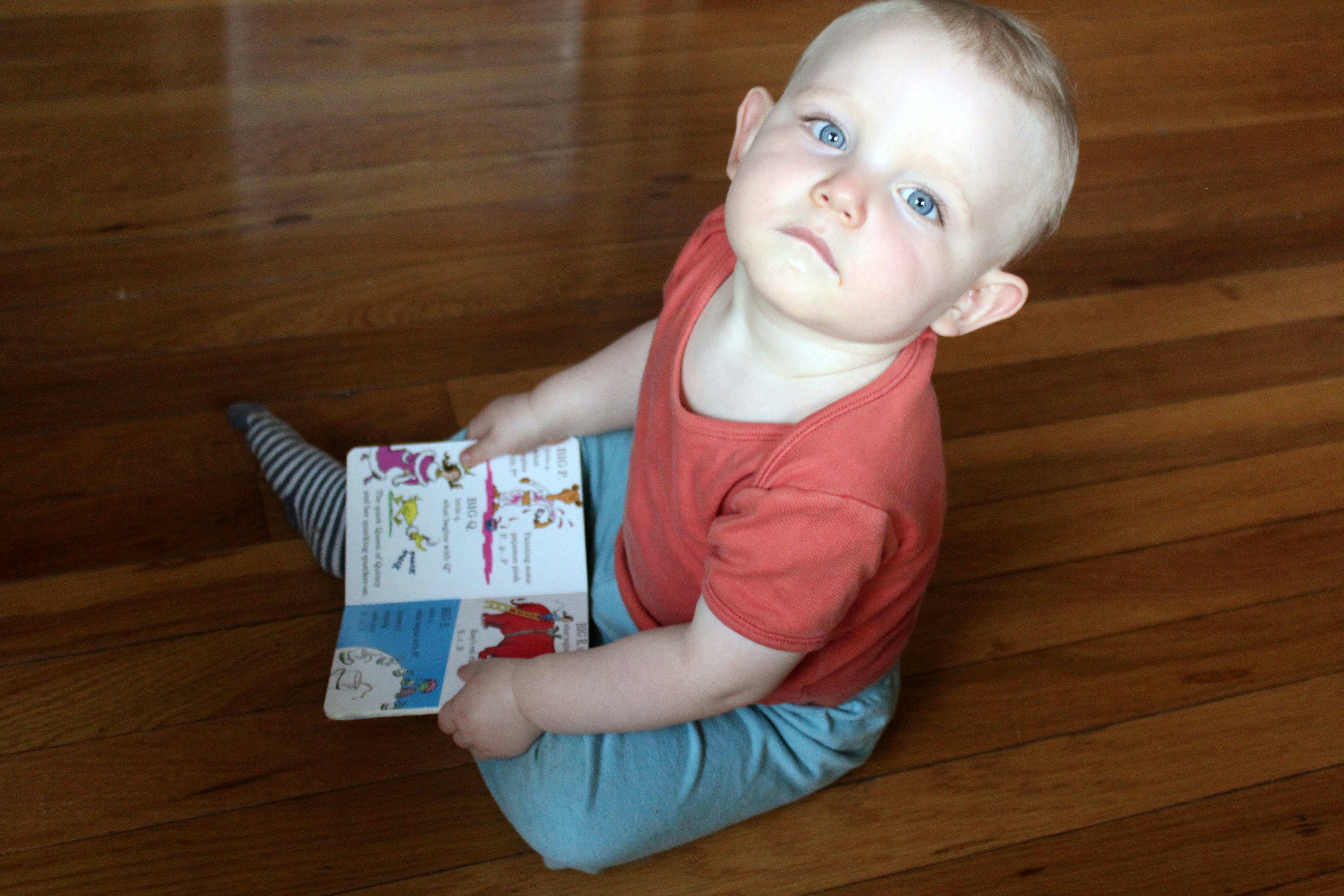 15 Adorable Photos Of Babies And Books