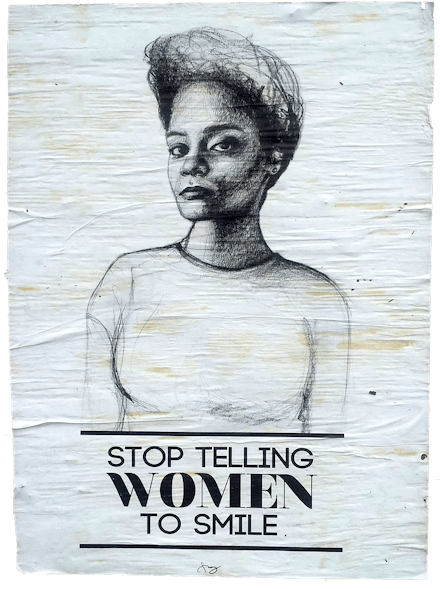 A piece of street art with a sketch of a woman and beneath her text that says "stop telling women to...
