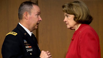 Dianne Feinstein talking to a man about the NSA's Dragnet Surveillance of Americans