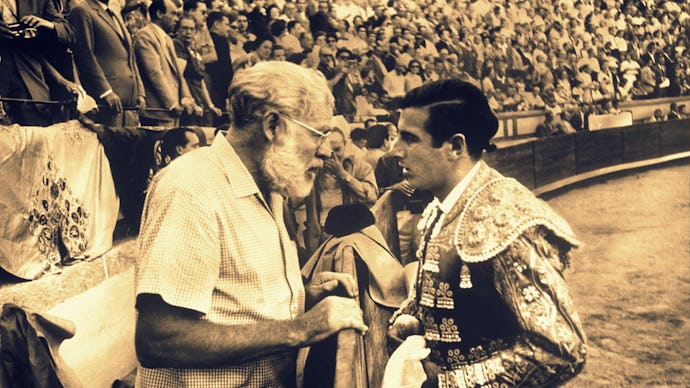 Ernest Hemingway and Matador Antonio Ordonez facing each other