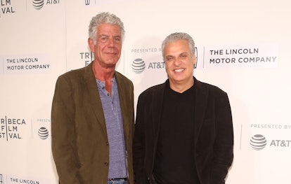 Anthony Bourdain and Eric Ripert posing during a red carpet event