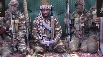 Boko Haram soldiers sitting together