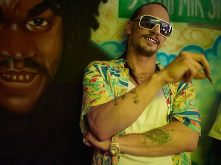 James Franco as Alien in Spring Breakers with cornrows, grills in his teeth, a short-sleeved yellow ...