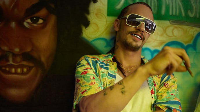 James Franco as Alien in Spring Breakers with cornrows, grills in his teeth, a short-sleeved yellow ...