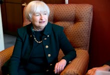  Janet Yellen sitting in an armchair