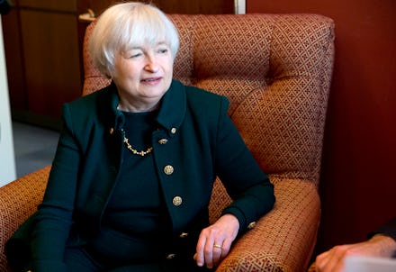 Janet Yellen sitting in an armchair